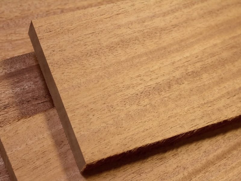 Close-up of stacked hardwood lumber ends showing grain