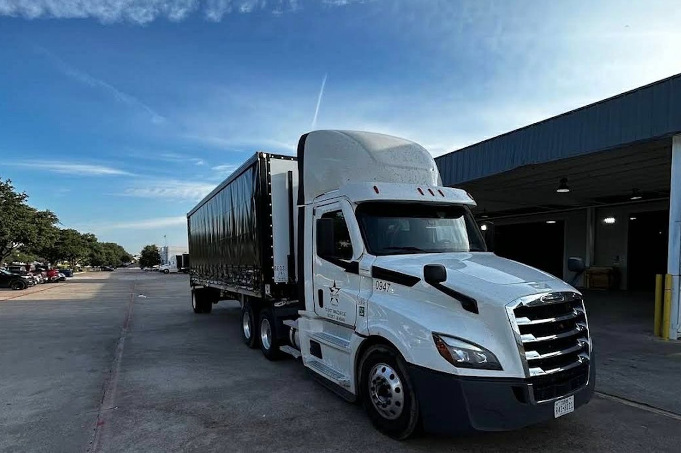 Brazos Forest Products delivery truck at the warehouse loading dock